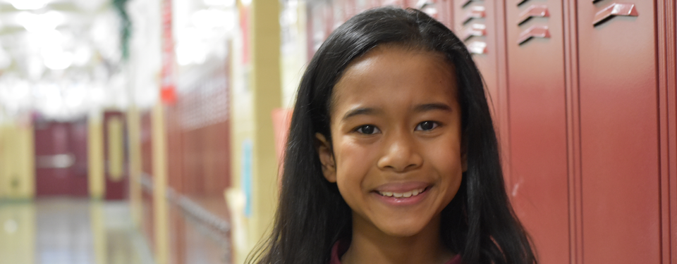 Student is standing at corridor